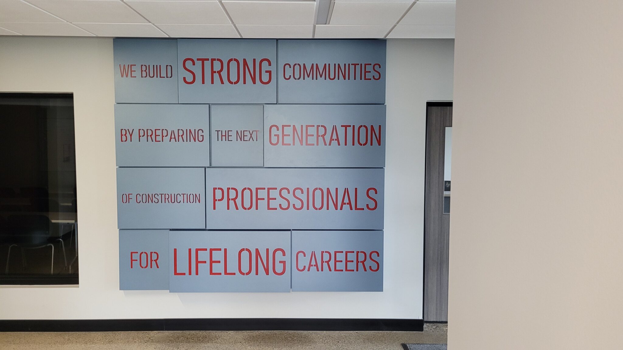 Photos of the WMCI values that are hung in the entry way to the institute