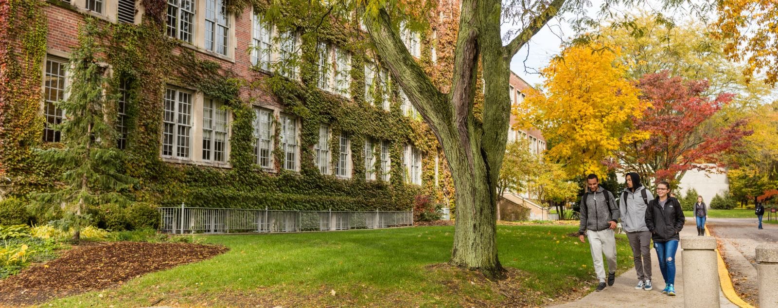 Students walking through Aquinas College's Campus