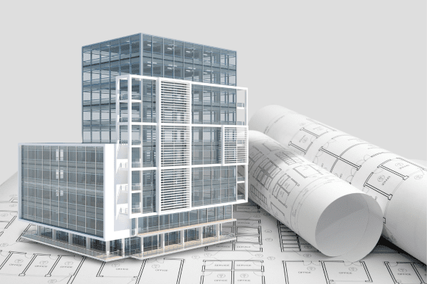 Graphic of the exterior envelope of a commercial building being framed on top of blueprints.