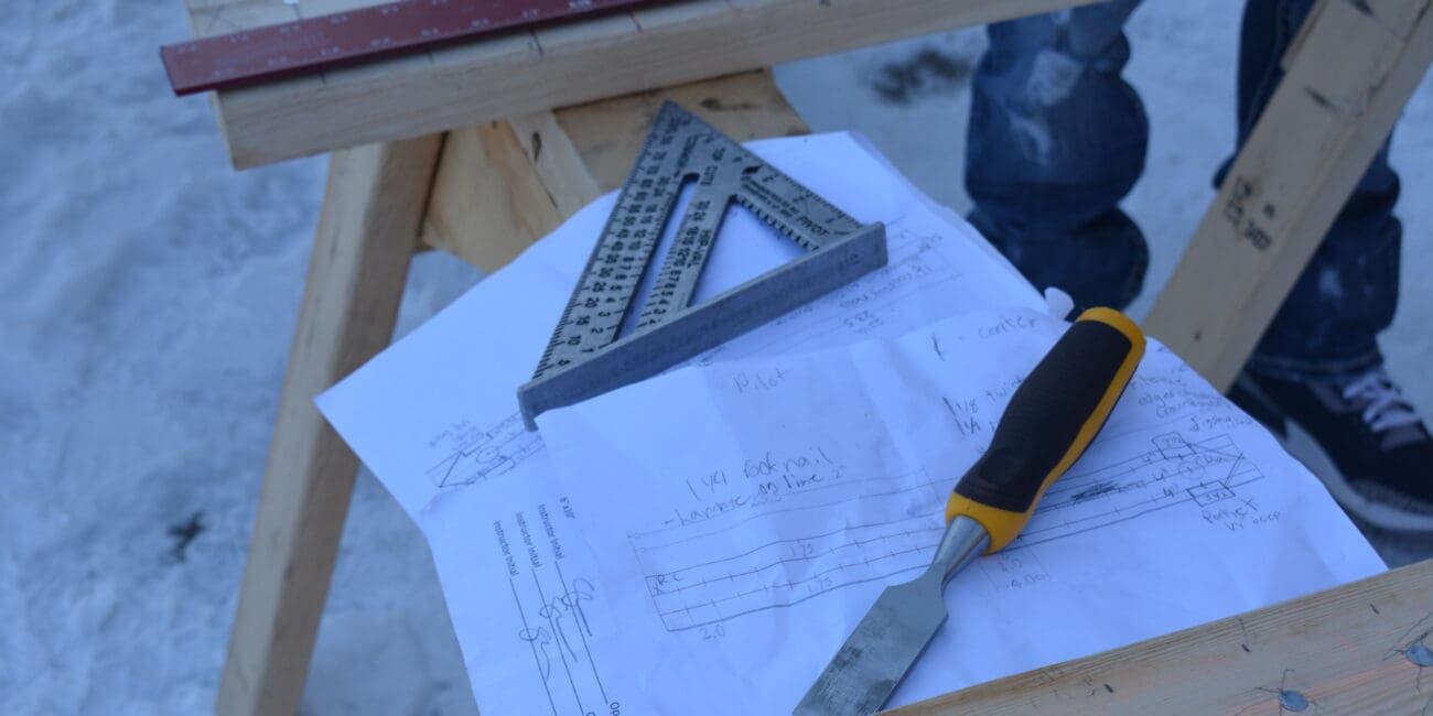 Tools for Tomorrow tools on a sawhorse