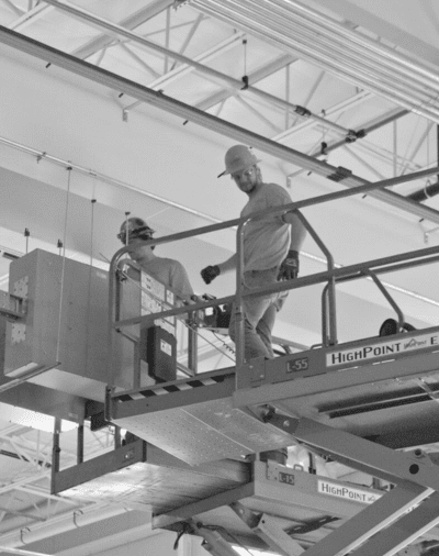 Highpoint Electricians work on a commercial construction jobsite