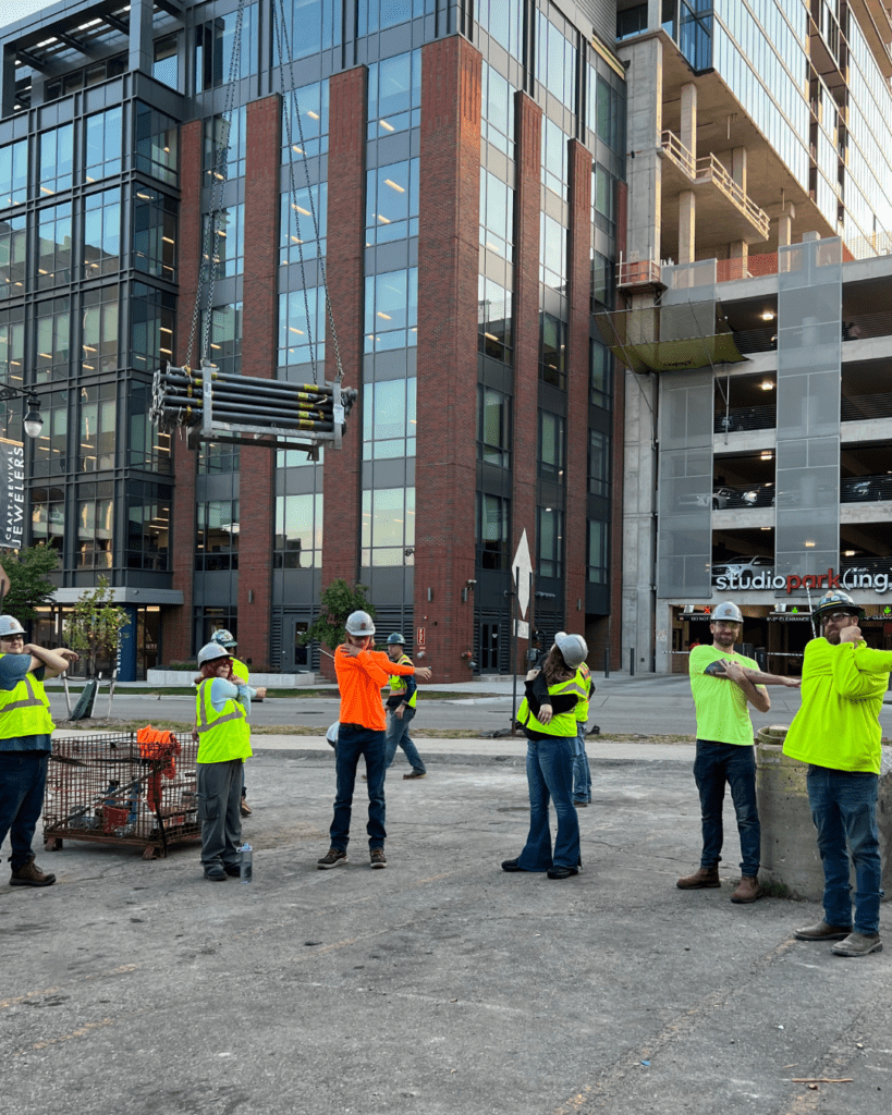 Kyle Jelens leading a group of WMCI high school students on a jobsite tour of Grand Rapid's Studio Park construction site.