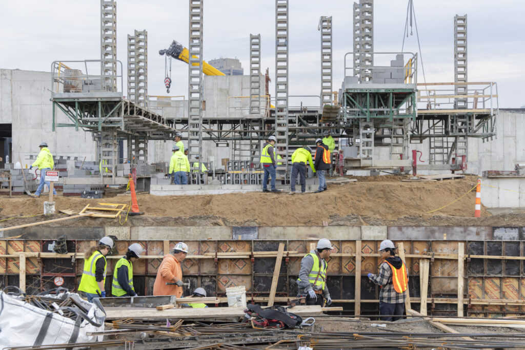 A group of WMCI students visit the new amphitheater construction project in Grand Rapids, MI.