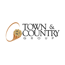 Town & Country Group logo featuring an orange swoosh and grape cluster next to the text 'Town & Country Group'.