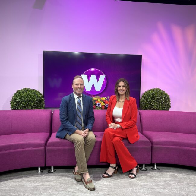 Jen Schottke in the Wood TV studio for her interview on the West Michigan trades.